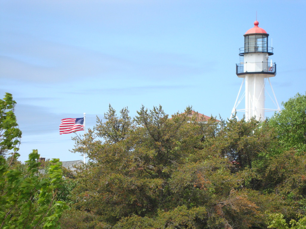 Lighthouse With American Flag